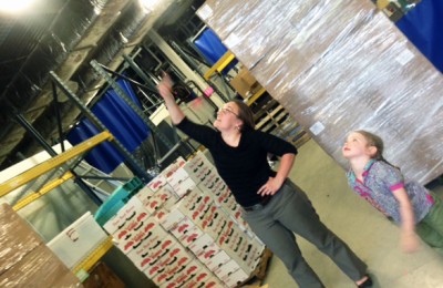 Woman and young girl touring a warehouse at the Center for an Agricultural Economy